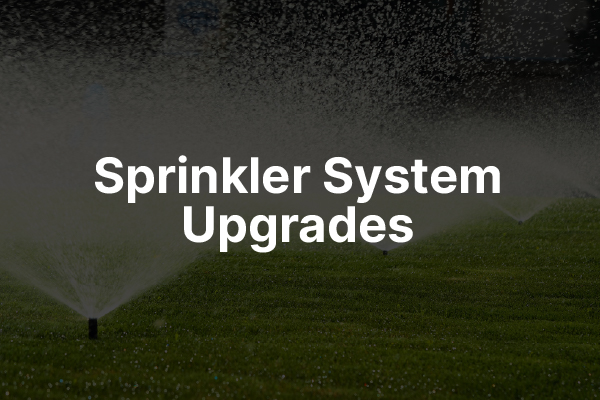 The text "Sprinkler System Upgrades" in front of sprinklers.